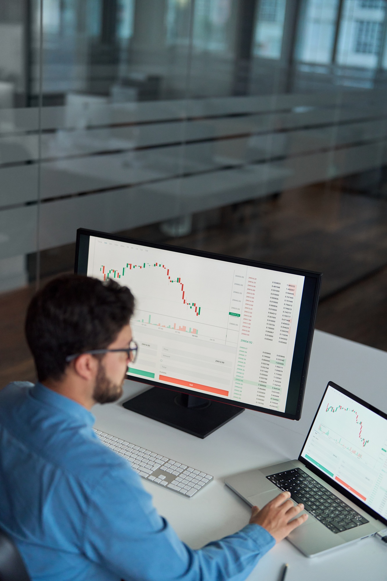 Busy business man broker analyst investor using computer analyzing stock market.